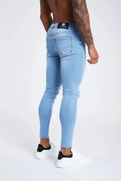 SKINNY FIT JEANS RIPPED AND REPAIRED - LIGHT BLUE