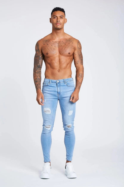 SKINNY FIT JEANS RIPPED AND REPAIRED - LIGHT BLUE